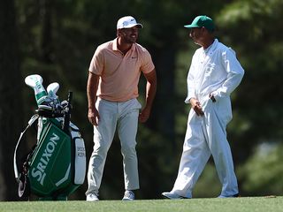 Brooks Koepka with his caddie at Augusta National