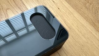 Bose smart ultra soundbar close up showing a grille for an upfiring speaker