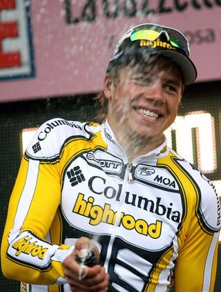 Edvald Boasson Hagen uncorks the champagne after his Giro d'Italia stage win.