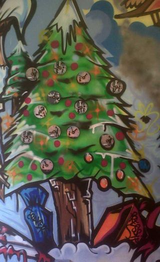 Graffik Gallery Christmas mural 2011 - clocks by Banksy