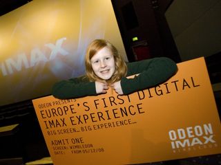 Kenra seems pretty happy to be at the Odeon's launch of new digital IMAX cinemas in London