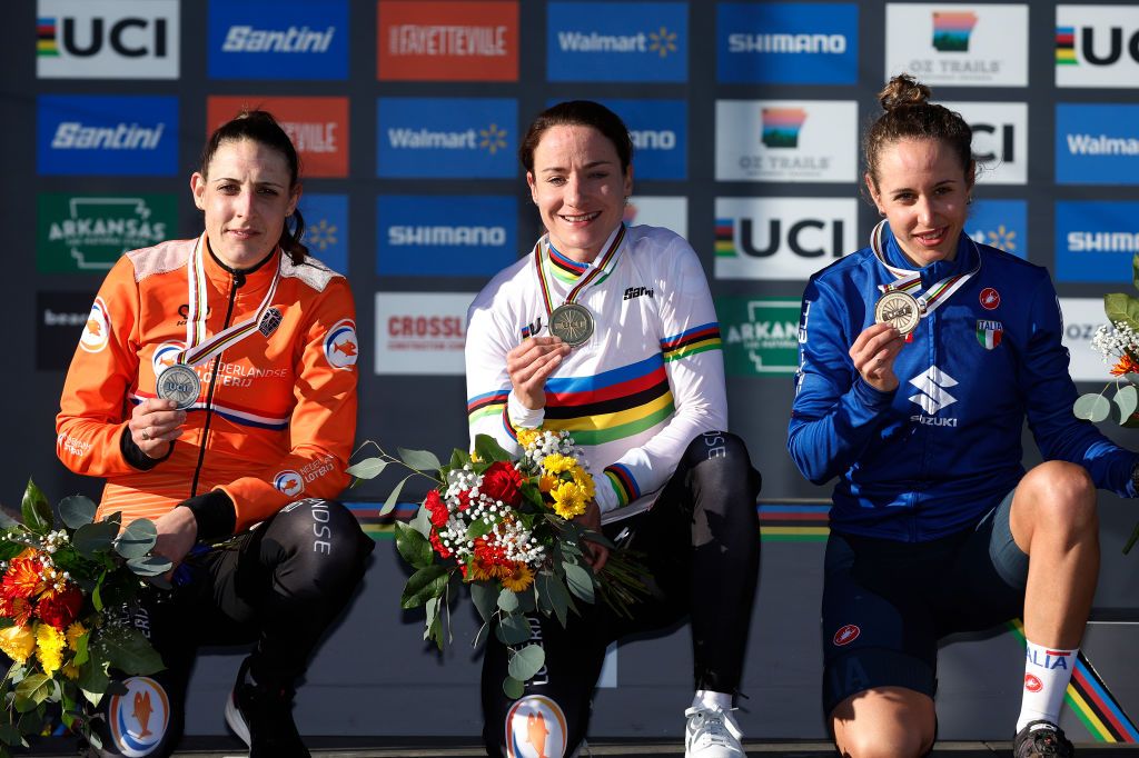 FAYETTEVILLE ARKANSAS JANUARY 29 LR Silver medalist Lucinda Brand of Netherlands gold medalist Marianne Vos of Netherlands and bronze medalist Silvia Persico of Italy pose on the podium during the medal ceremony after the 73rd UCI CycloCross World Championships Fayetteville 2022 Womens Elite Fayetteville2022 on January 29 2022 in Fayetteville Arkansas Photo by Chris GraythenGetty Images