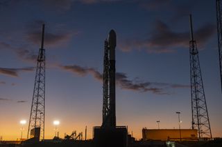 A SpaceX Falcon 9 rocket carrying 60 satellites for the company's Starlink broadband internet constellation stands atop Space Launch Complex 40 at Cape Canaveral Air Force Station in Florida ahead of a Nov. 11, 2019 launch.