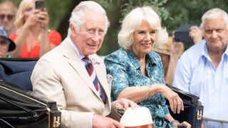 Prince Charles, Prince of Wales and Camilla, Duchess of Cornwall during a visit to The Sandringham Flower Show 2022