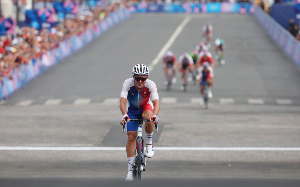 PARIS FRANCE AUGUST 03 Valentin Madouas of Team France celebrates at finish line as Silver medal winner during the Mens Road Race on day eight of the Olympic Games Paris 2024 at trocadero on August 03 2024 in Paris France Photo by Jared C TiltonGetty Images
