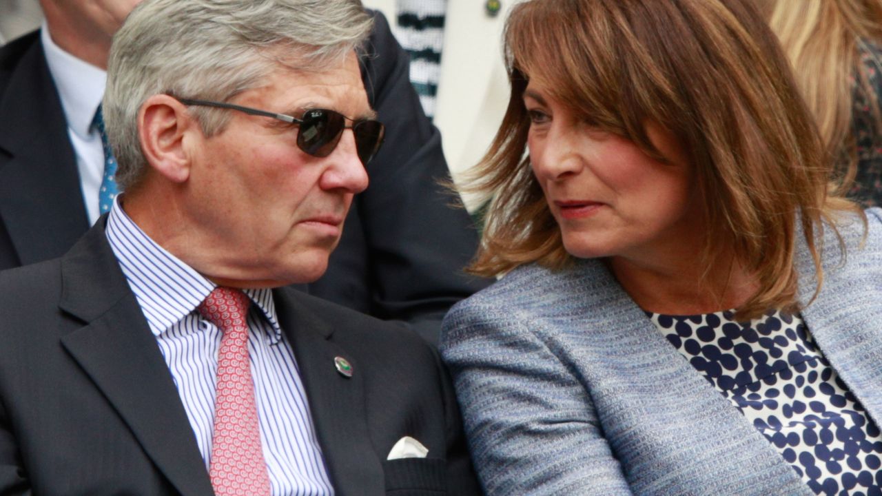 Michael and Carole Middleton are in conversation as they watch on from the stands in centre court as Julien Benneteau of France is in action during the Men&#039;s Singles second round match against Kei Nishikori of Japan on day four of the Wimbledon Lawn Tennis Championships at the All England Lawn Tennis and Croquet Club on June 30, 2016 in London, England