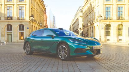 Denza Z9 GT EV on cobbled street