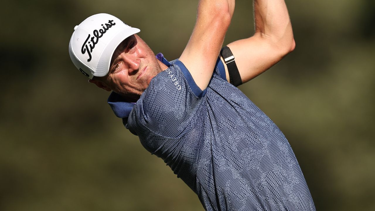 Justin Thomas takes a shot during the Wyndham Championship at Sedgefield Country Club