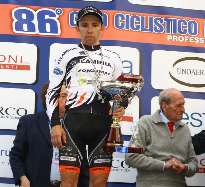 Ivan Rovny on the podium in Toscana