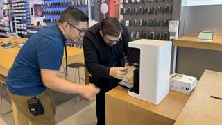 Apple Vision Pro demo appointment - putting glasses in lensometer machine to select Zeiss lens inserts
