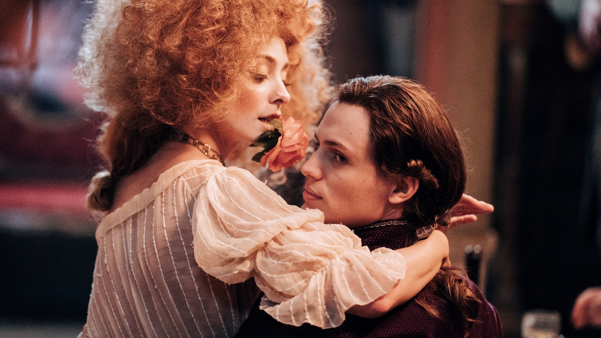 Orleans sits with an actor playing the Queen on his lap in Marie Antoinette