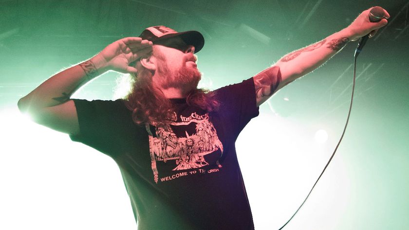 At The Gates singer Tomas Lindberg onstage in 2014