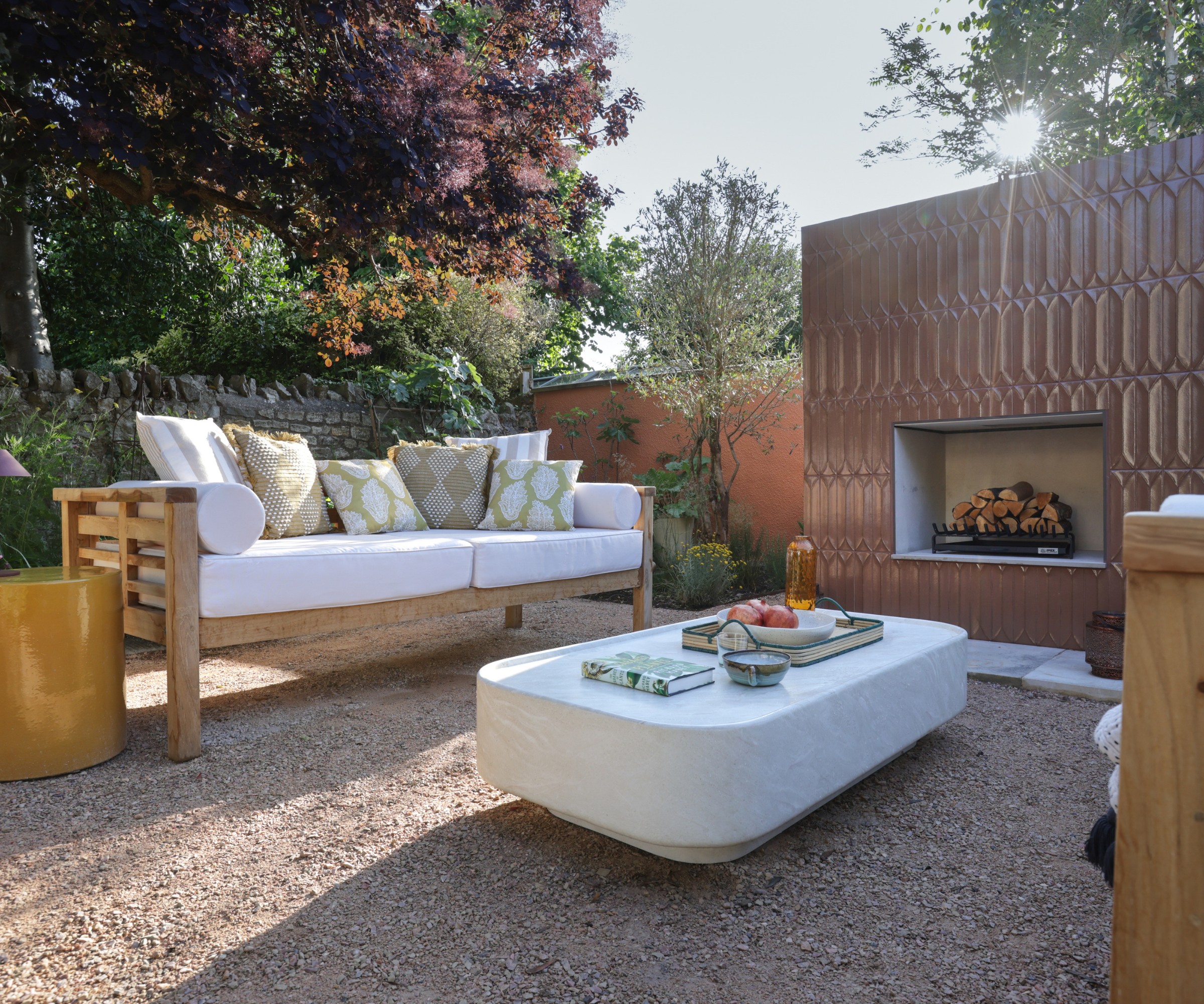 outdoor seating area near tile fireplace