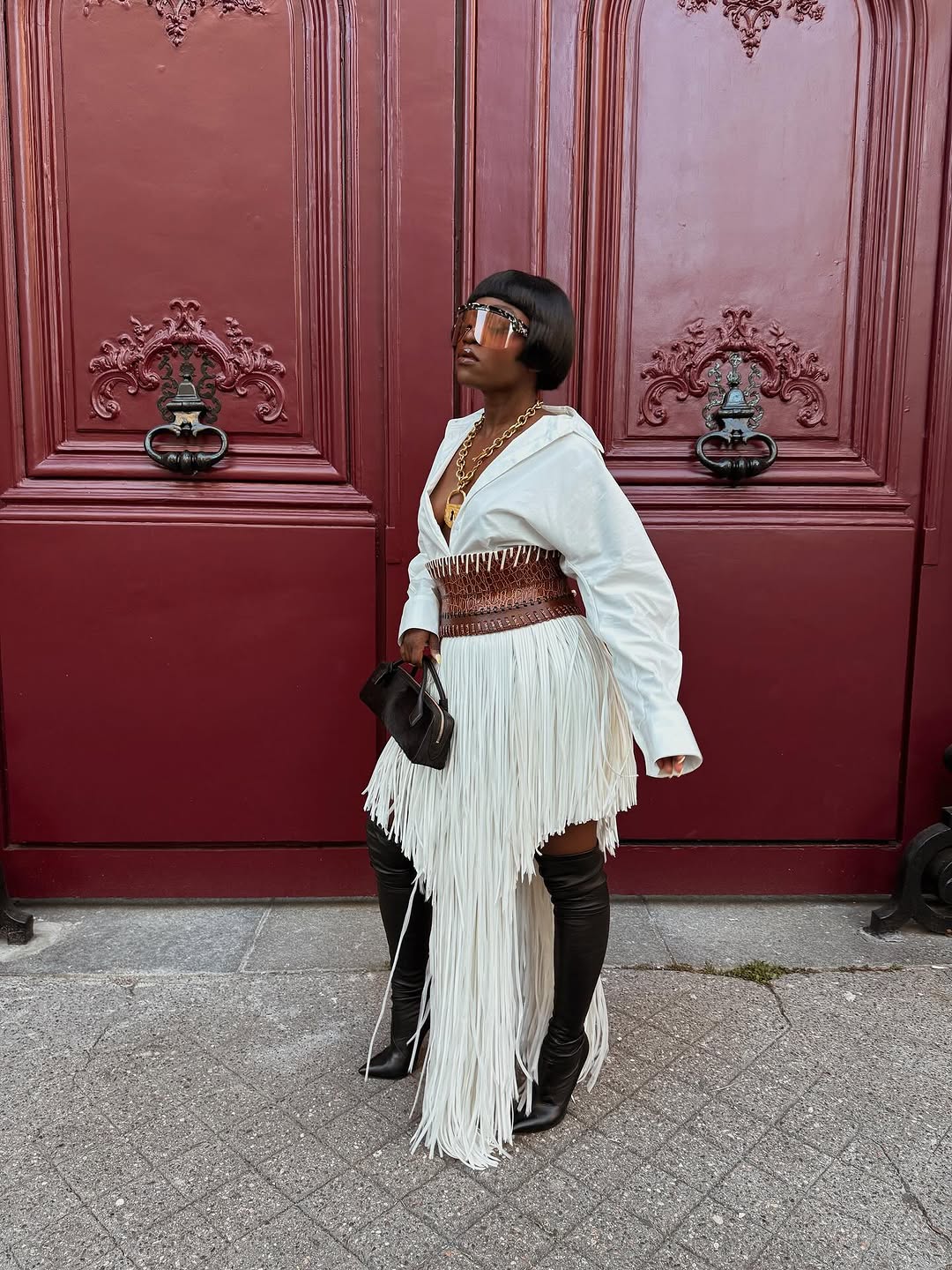 woman wearing over the knee boot outfit 2026