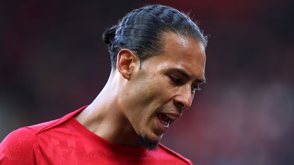 Virgil van Dijk of Liverpool looks on as he warms up for the RB Leipzig vs Liverpool live stream in the Champions League