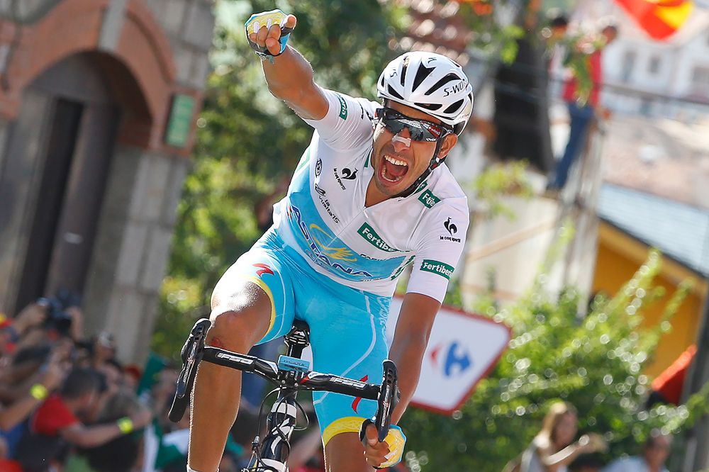 Fabio Aru celebrates taking the Vuelta's overall lead at the finish of stage 20.