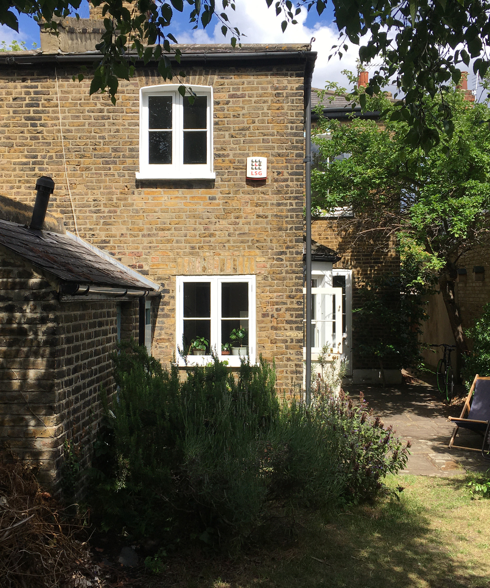 Rear shot of a semi detached house before an extension project