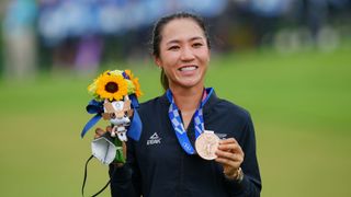 New Zealand's Lydia Ko holds her bronze medal during the victory ceremony for the women's individual strokeplay competition at the Tokyo 2020 Olympic Games