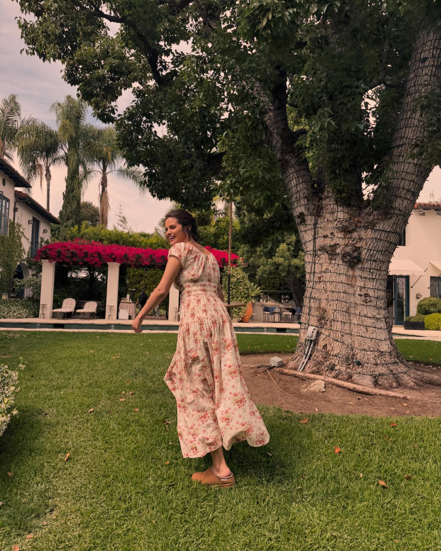 Selena Gomez styled a floral Doen dress with Ugg slippers for her Instagram post