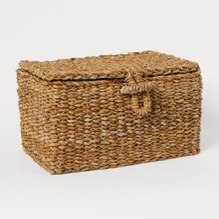 Lidded storage basket
