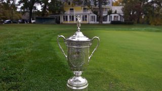 The US Open Trophy on the 18th green at Brookline