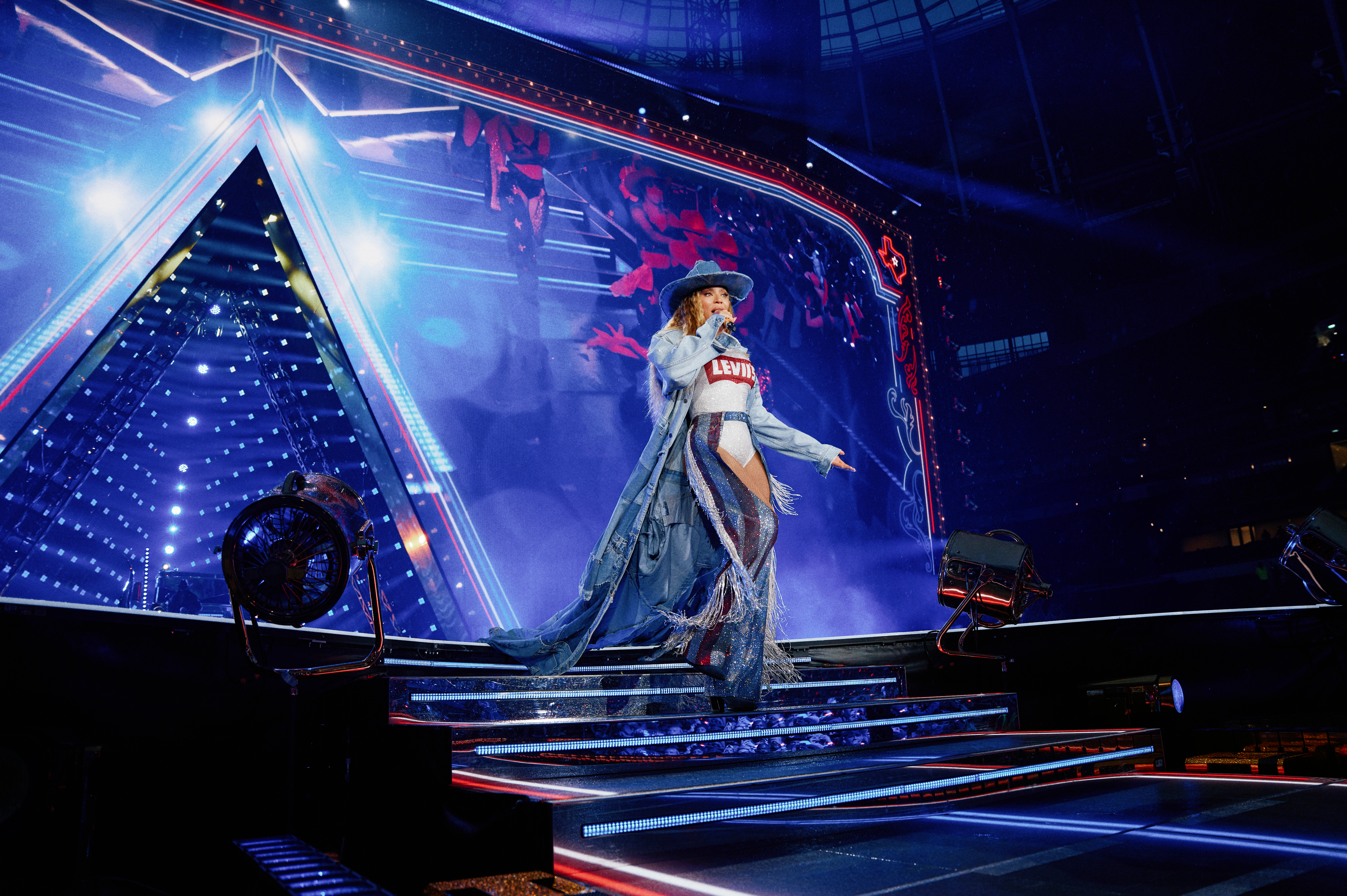 Beyoncé takes center stage at the 'Cowboy Carter' concert in a custom denim Levi's look.