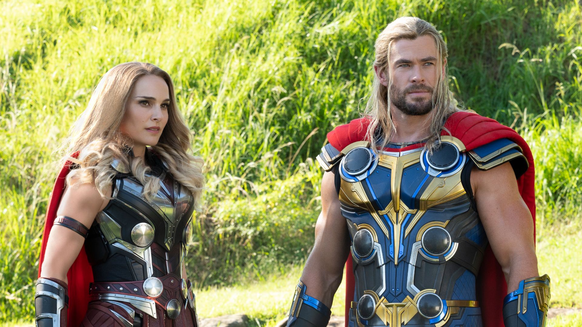 Natalie Portman as Jane Foster the Mighty Thor and Chris Hemsworth as Thor Odinson in Thor: Love and Thunder