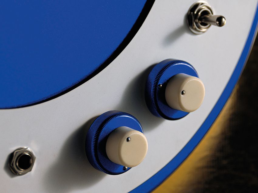 Each pickup has its own dual-concentric volume and tone knob.