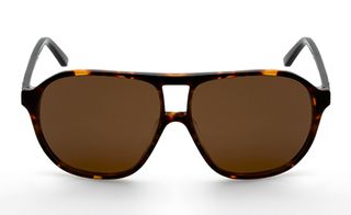Tortoiseshell oval framed sunglasses with dark brown tinted lenses.