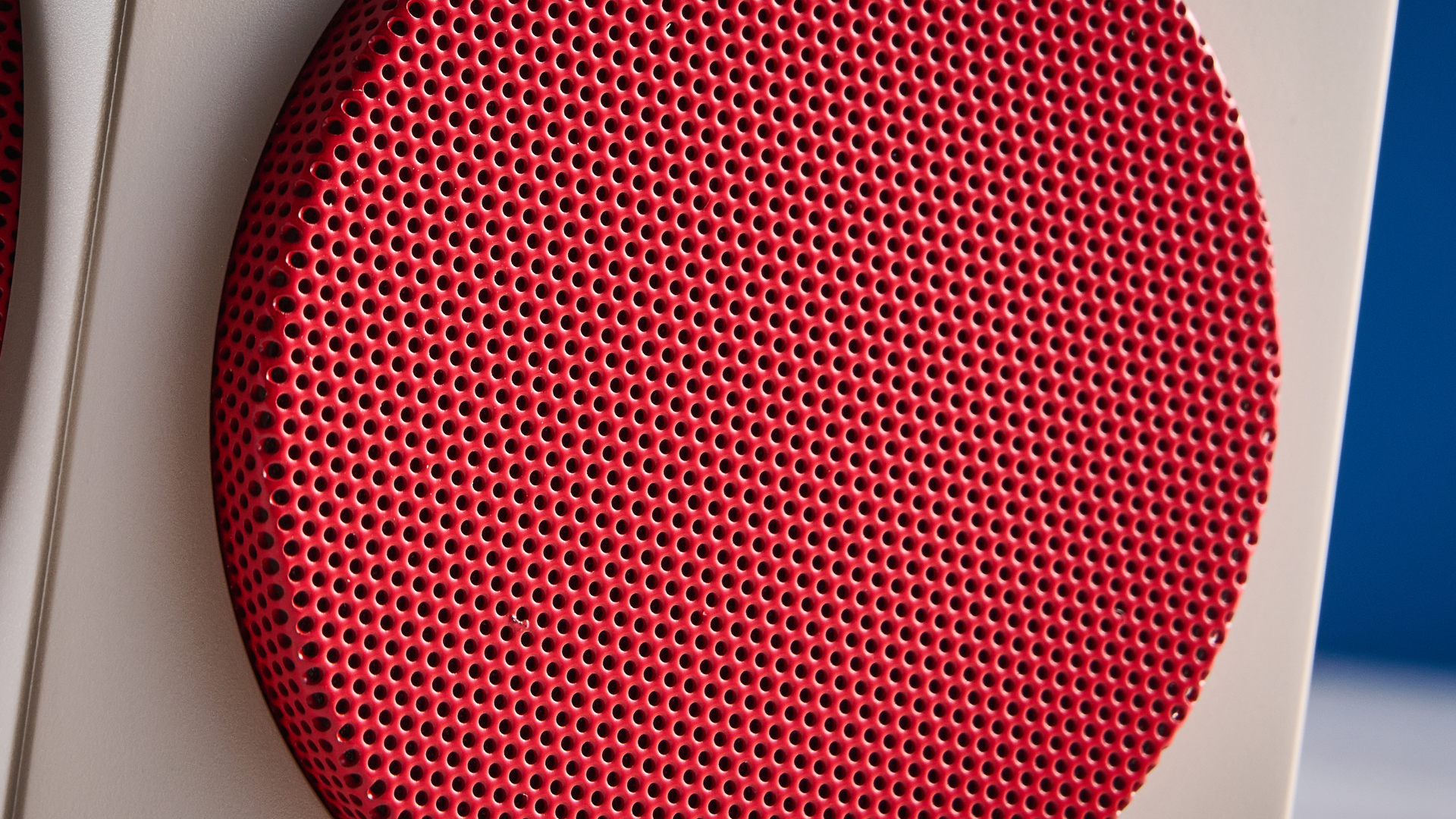 A beige, red and black 8BitDo Retro Cube 2 Bluetooth speaker