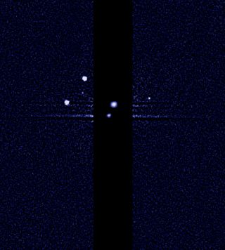 A team of astronomers using NASA's Hubble Space Telescope is reporting the discovery of another moon orbiting the icy dwarf planet Pluto. Image released July 11, 2012.