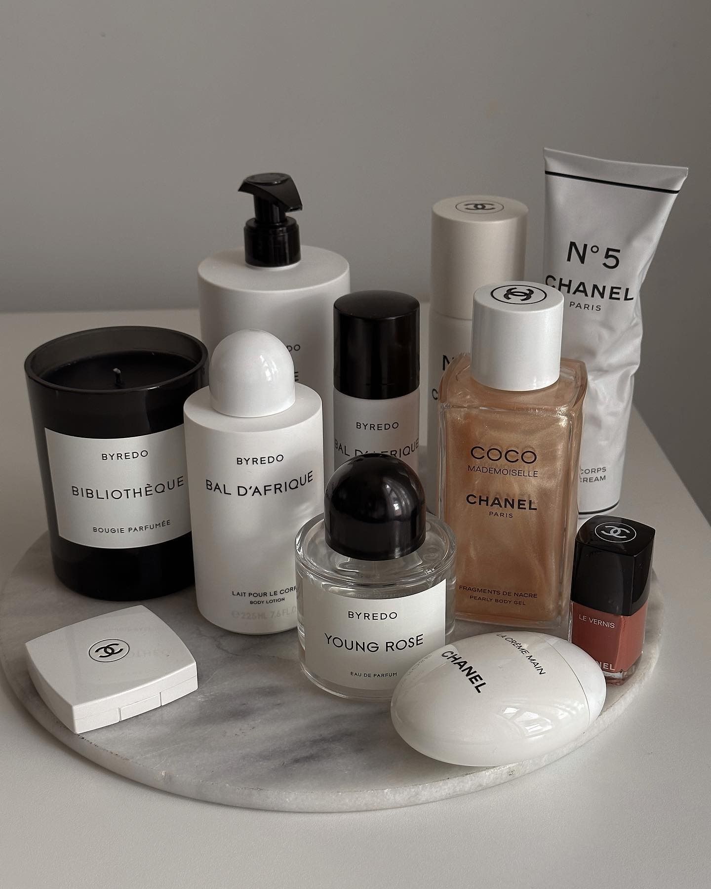 Platter displaying Byredo and Chanel products.