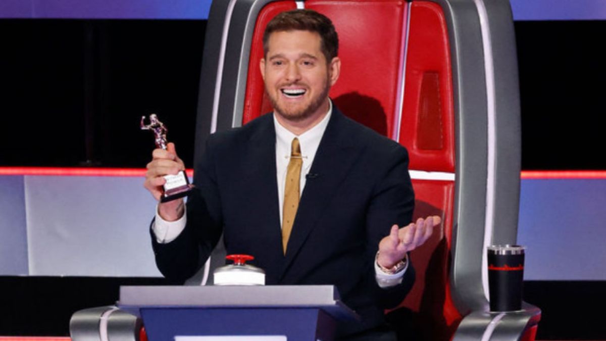 Michael Buble holds a &quot;Woman Power&quot; trophy on The Voice Season 27.