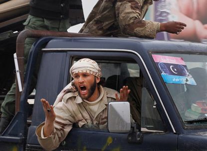 Libyan rebels after Nato friendly fire incident