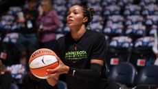 Napheesa Collier of the Minnesota Lynx warms up prior to a WNBA game.