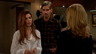 Amelia Heinle and J . Eddie Peck as Victoria and Cole talking to someone in The Young and the Restless