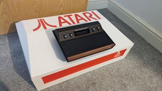 Atari 2600+ review; a retro console on a box marked Atari