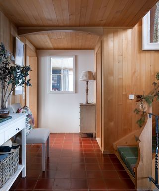 wood clad hallway in Swiss chalet by Sims Hilditch