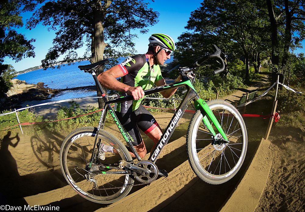 Ryan Trebon (Cannondale) racing in front of picturesque Gloucester Harbor