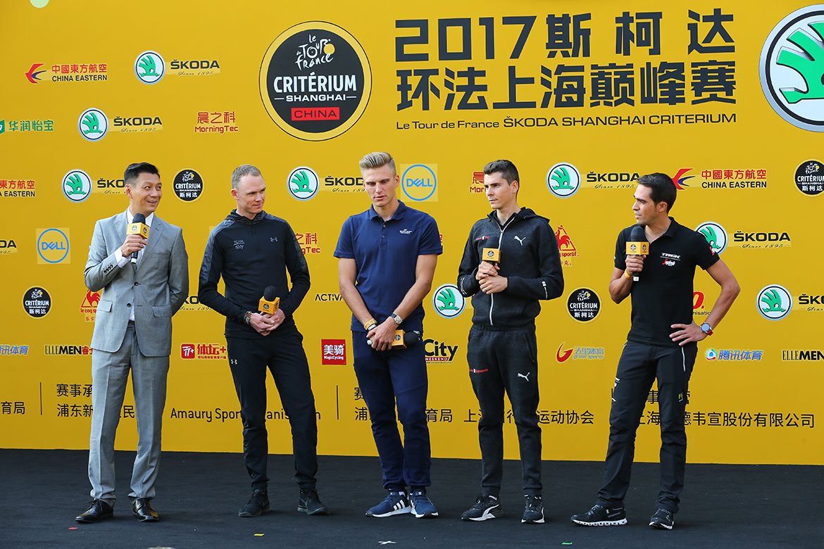 (L-R) Chris Froome, Marcel Kittel, Warren Barguil and Alberto Contador talk to the crowd