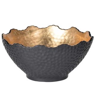 Black and gold beaten bowl