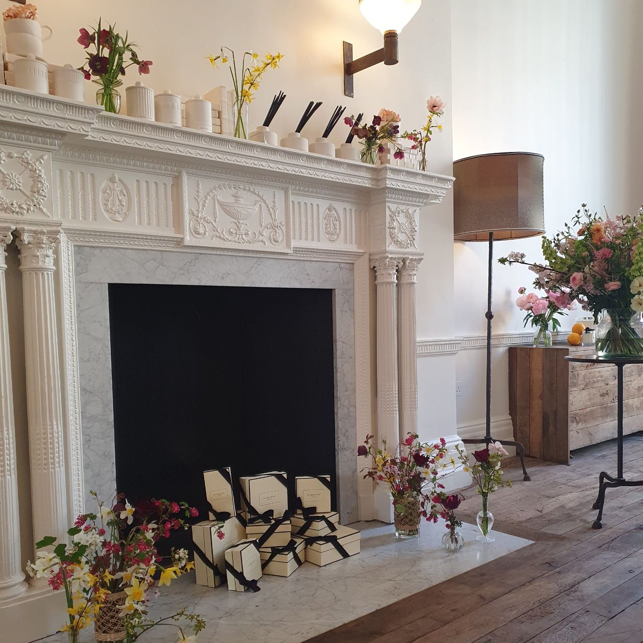 A display of Jo Malone Townhouse scented candles and reed diffusers at the brand's townhouse