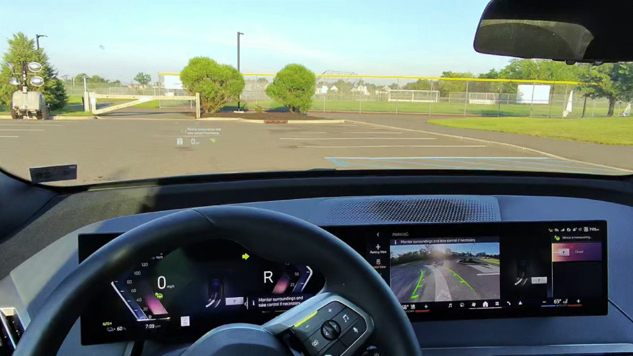 Gif animation showing 2026 BMW ix xDrive45 auto park.