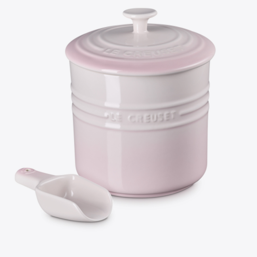 ombre pink stone jar with a mini scoop made by Le Creuset