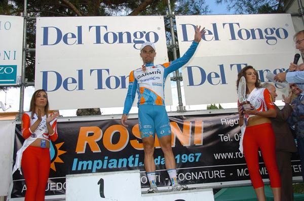 Third place finisher Caleb Fairly (Garmin - Transitions) waves to the crowd.
