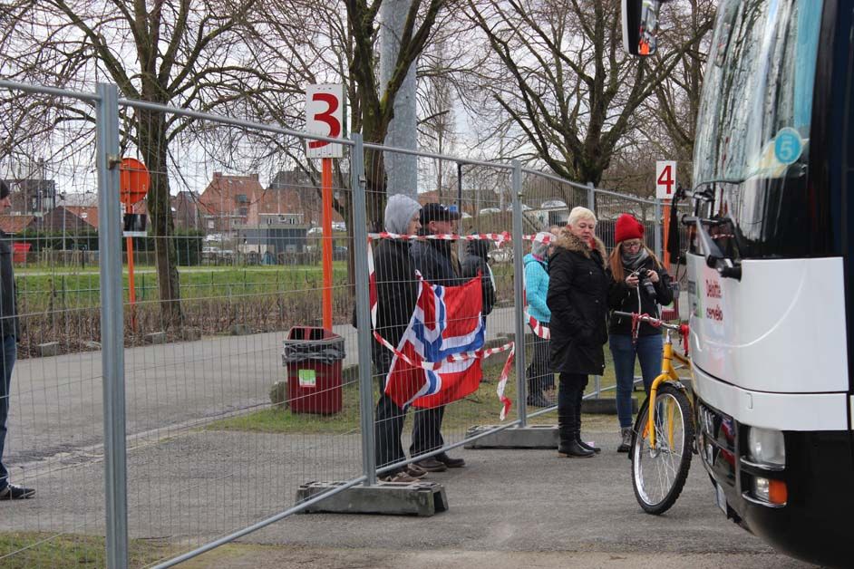 Norwegian fans wait outside the Dimension Data bus