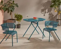 A contemporary metal bistro set in teal blue with mesh-backed chairs