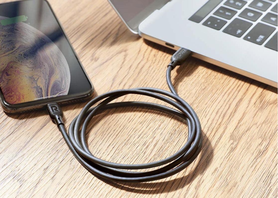 RAVPower USB-C to Lightning cable connecting MacBook and iPhone