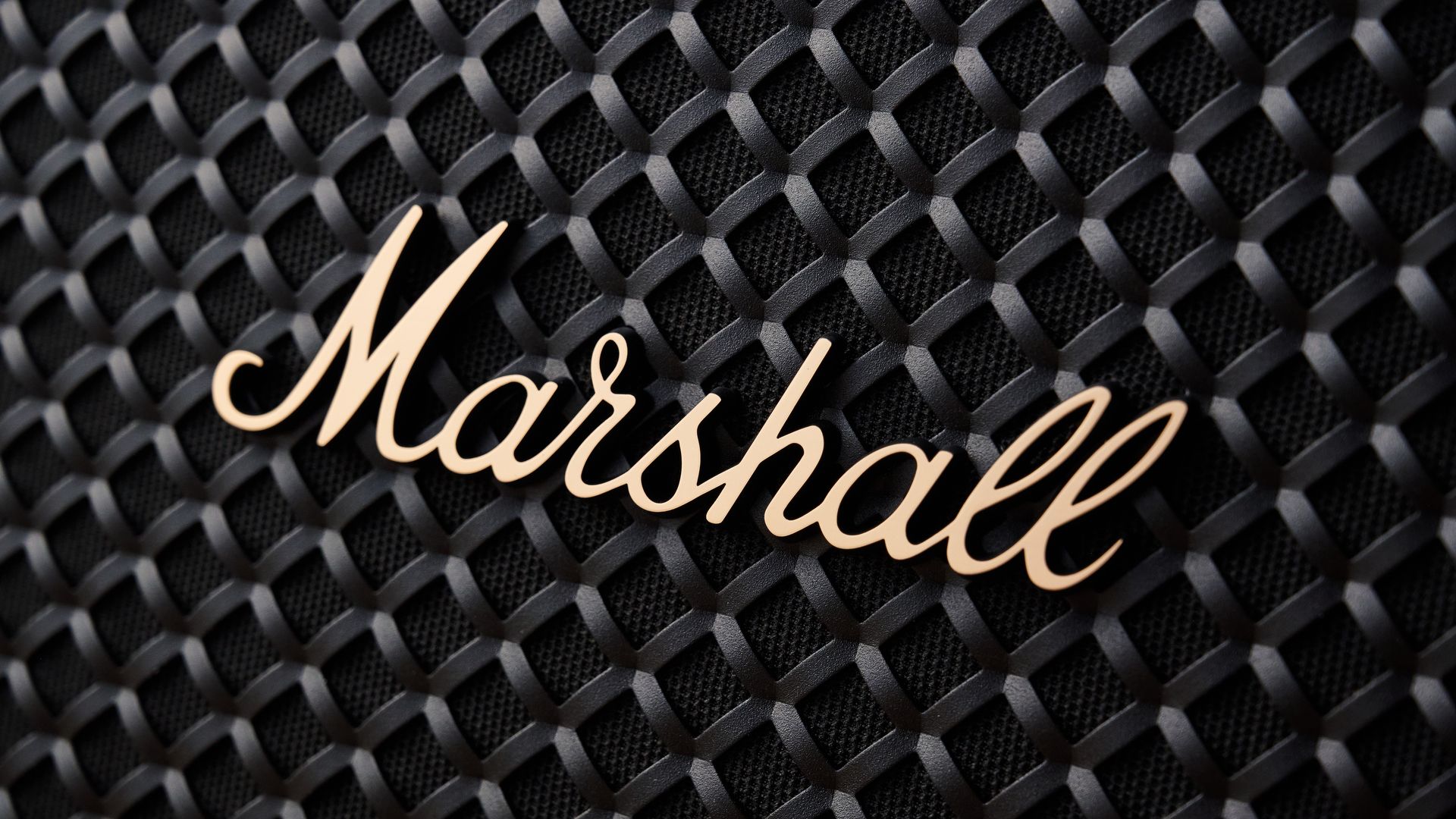 A black and brass Marshall Bromley 150 portable party speaker