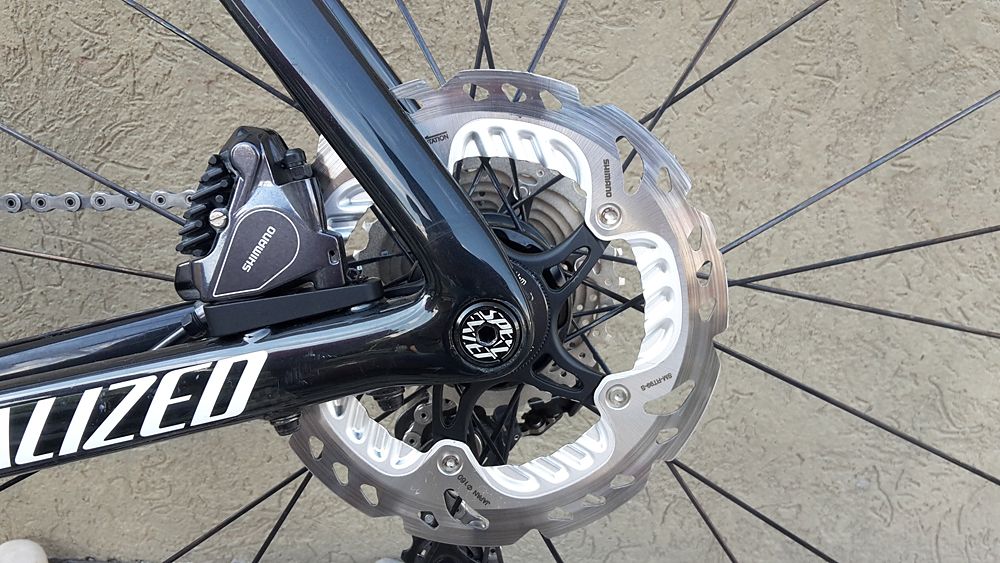 Shimano's BR-RS785 flat-mount hydraulic disc brake and RT99-S center lock disc rotor in 160mm